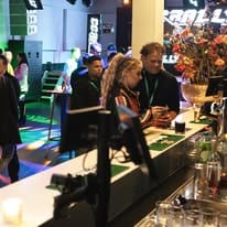 Members and guests at the bar during CCRally drinks