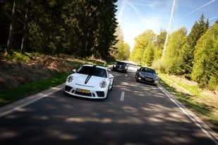 Sports cars on the road during End of Summer